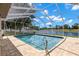 Beautiful pool with screened enclosure offers stunning water views at 12339 Roseland Dr, New Port Richey, FL 34654