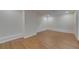 Cozy basement featuring new floors, neutral walls, and ample space at 12434 Cody Dr, Wimauma, FL 33598
