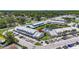 Overhead shot showing the Hampton Park community with lovely landscaping, parking, and pond views at 12648 Castle Hill Dr, Tampa, FL 33624