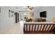 Bright living room featuring tile flooring, comfortable seating, and sliding doors to the outside at 12648 Castle Hill Dr, Tampa, FL 33624