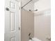 Shower stall featuring tile walls and updated fixtures at 12648 Castle Hill Dr, Tampa, FL 33624
