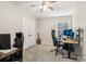 Neutral bedroom featuring plush carpet, ceiling fan, and versatile space for work or hobbies at 12830 Bent Twig Dr, Riverview, FL 33579