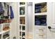 Organized closet featuring shelving and drawers with gold hardware at 12830 Bent Twig Dr, Riverview, FL 33579