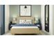Beautifully staged bedroom showcasing a comfortable bed, stylish nightstands, and elegant artwork at 12949 Shining Blue Nile Ln, Parrish, FL 34219