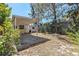 Spacious backyard with a covered patio area, perfect for outdoor entertaining and relaxation at 1310 43Rd S St, St Petersburg, FL 33711