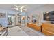 Bedroom with a peek into the bathroom and kitchen at 13720 Gulf Blvd # 302, Madeira Beach, FL 33708