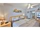 Bedroom featuring neutral walls and floors plus a large window for natural light at 13720 Gulf Blvd # 302, Madeira Beach, FL 33708