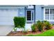 Close up of the front door to a beautiful home with a decorative glass insert at 14116 Whitecap Ave, Hudson, FL 34667