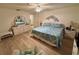 The primary bedroom suite with a comfortable sitting area is bathed in natural light at 16330 Gulf Blvd # 201, Redington Beach, FL 33708