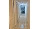 Hallway with tile floor and access to the dining room at 16330 Gulf Blvd # 201, Redington Beach, FL 33708