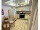 Compact kitchen with ample storage and modern appliances at 16330 Gulf Blvd # 201, Redington Beach, FL 33708