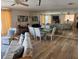 Inviting living area features dining space, mirror wall, and comfortable furnishings at 16330 Gulf Blvd # 201, Redington Beach, FL 33708