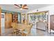 Inviting dining area adjacent to the living room, featuring a wooden table and stylish accents at 1701 66Th N Ave, St Petersburg, FL 33702