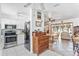 Bright kitchen with white cabinetry, stainless steel appliances, and a convenient layout at 1701 66Th N Ave, St Petersburg, FL 33702