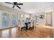 Open dining area with hardwood floors, French doors, and stylish decor at 1708 Julian Lane Dr, Tampa, FL 33619