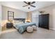 Serene bedroom featuring a plush bed, neutral tones, and ample natural light at 1708 Julian Lane Dr, Tampa, FL 33619