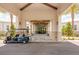 The community entrance is framed by stone columns and features an intricate ceiling design at 17263 Mango Shay Ct, Land O Lakes, FL 34638