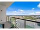 Balcony view featuring a glass railing overlooking the city, the bay, and the Albert Whitted Airport at 199 Dali Blvd # 2, St Petersburg, FL 33701