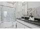Stylish bathroom with marble tile, shower with glass door, and sleek vanity at 199 Dali Blvd # 2, St Petersburg, FL 33701
