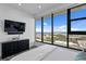 Bright modern bedroom with scenic water views, minimalist decor and wood-look floors at 199 Dali Blvd # 2, St Petersburg, FL 33701