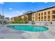 Community pool with inviting waters and ample deck space for lounging in the sun at 199 Dali Blvd # 2, St Petersburg, FL 33701