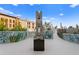 Beautiful courtyard featuring a modern metal sculpture and painted murals, providing a serene outdoor space at 199 Dali Blvd # 2, St Petersburg, FL 33701
