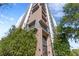 Exterior shot of the Salvador building entrance with its modern architectural design and landscaping at 199 Dali Blvd # 2, St Petersburg, FL 33701
