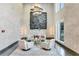 Contemporary lobby with modern art, stylish seating, and high ceilings create an inviting atmosphere at 199 Dali Blvd # 2, St Petersburg, FL 33701