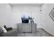 Comfortable home office with a desk, art, and a calming color scheme to enhance the workspace at 199 Dali Blvd # 2, St Petersburg, FL 33701