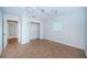 Bright bedroom featuring a ceiling fan, natural light, wood floors and a closet at 209 S Greenfield Ave, Temple Terrace, FL 33617