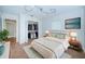 Cozy bedroom featuring stylish decor, a comfortable bed, and a closet at 209 S Greenfield Ave, Temple Terrace, FL 33617