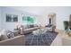 Bright and inviting living room featuring stylish decor and a comfortable seating area at 209 S Greenfield Ave, Temple Terrace, FL 33617