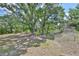 Expansive property with mature trees and partially cleared for new owners' visions at 2112 33Rd Se St, Ruskin, FL 33570