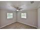 A bright bedroom with wood-look floors and multiple windows to let in sunlight at 2112 33Rd Se St, Ruskin, FL 33570