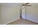 Inviting bedroom with natural light, wood-look flooring, and neutral paint at 2112 33Rd Se St, Ruskin, FL 33570