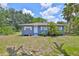 Charming single-story home with a manicured lawn and front yard landscaping at 2112 33Rd Se St, Ruskin, FL 33570