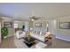 Bright living room boasts neutral walls, hardwood floors, modern furniture and natural light at 2112 33Rd Se St, Ruskin, FL 33570