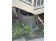 An outdoor view of an air conditioning unit for a single-Gathering home at 2533 Dolly Bay Dr # 203, Palm Harbor, FL 34684