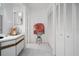 Clean bathroom featuring a vanity with ample storage and a neutral color palette at 2533 Dolly Bay Dr # 203, Palm Harbor, FL 34684
