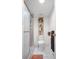 Cozy bathroom featuring a glass-enclosed shower and decorative shelving at 2533 Dolly Bay Dr # 203, Palm Harbor, FL 34684