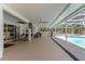 Large covered patio area with ample seating space, perfect for hosting gatherings and enjoying the outdoors at 27709 Robin Roost Ln, Wesley Chapel, FL 33544