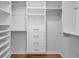 Custom closet with built-in shelving and drawers, designed for optimal organization at 3002 Savannah Oaks Cir, Tarpon Springs, FL 34688
