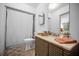 Clean and bright bathroom featuring a shower with tub and modern sink at 314 Bath St, Tarpon Springs, FL 34689