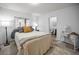 Cozy bedroom with a neutral color scheme and ensuite bathroom at 314 Bath St, Tarpon Springs, FL 34689