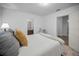 Comfortable bedroom with an ensuite bathroom and stylish decor at 314 Bath St, Tarpon Springs, FL 34689