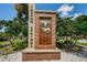A beautiful Tarpon Springs welcome sign adds character to this desirable historic neighborhood at 314 Bath St, Tarpon Springs, FL 34689