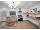 Bright kitchen with modern appliances, floating shelves, and ample counter space at 314 Bath St, Tarpon Springs, FL 34689