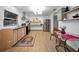 Spacious kitchen and dining area with stainless steel appliances and lots of natural light at 314 Bath St, Tarpon Springs, FL 34689
