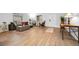Inviting living room with tile floors, modern furniture, and ample space for entertaining at 314 Bath St, Tarpon Springs, FL 34689