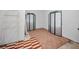 Empty room with patterned rugs and decorative folding screens provides a space for customization at 314 Bath St, Tarpon Springs, FL 34689